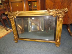 A MID VICTORIAN GILT OVERMANTLE MIRROR WITH CARVED DETAIL 82 X 130 CM