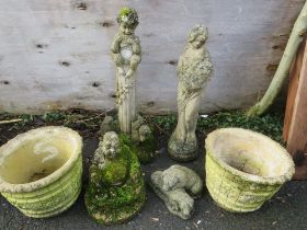 FOUR CONCRETE GARDEN STATUES AND TWO CONCRETE PLANTERS