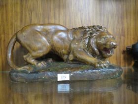 A LARGE POTTERY LION MODEL