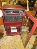 A TECHNICS SU-V570 AMP AND AN SL-P477A CD PLAYER IN CABINET