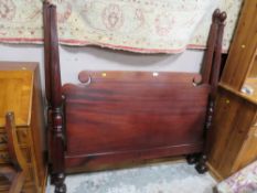 A MAHOGANY BALL AND CLAW DOUBLE BED FRAME WITH PINEAPPLE FINIALS ( ONE ABSENT ) W 145 CM