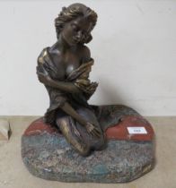 AN EBANO BRONZED SCULPTURE FROM THE VIDAL COLLECTION DEPICTING A KNEELING SEMI NUDE GIRL, raised