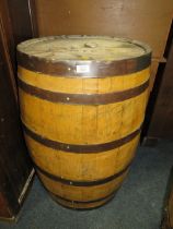 A LARGE BOUND OAK BARREL H- 88 CM