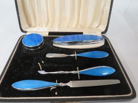 A CASED BLUE GUILLOCHE ENAMEL CHROME VANITY SET (MISSING SCISSORS)