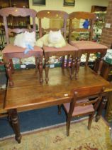 A COLONIAL STYLE HARDWOOD KITCHEN TABLE , FOUR CHAIRS AND TWO CATS