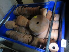 A TRAY OF TERRACOTTA POTS