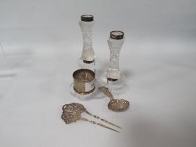 A HALLMARKED SILVER CADDY SPOON - NEWCASTLE 1874, probable repair to heal, together with a