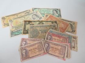 A COLLECTION OF GEORGE VI AND ELIZABETH II COMMONWEALTH BANKNOTES TO INCLUDE EXAMPLES FROM CANADA,