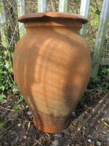 A LARGE TERRACOTTA GARDEN URN