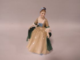 A ROYAL DOULTON "ELEGANCE" FIGURINE