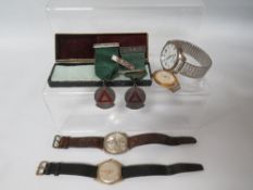 A SELECTION OF VINTAGE WRIST WATCHES , SAFE DRIVING MEDALS ETC