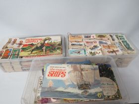 THREE TRAYS OF ASSORTED CIGARETTE CARDS TO INCLUDE SHIPS, CARS ETC