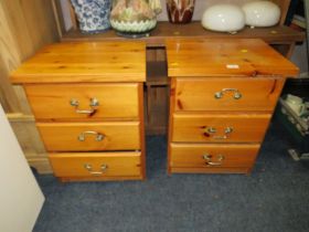 A PAIR OF PINE BEDSIDE CHESTS A/F TOGETHER WITH A HONEY PINE BLANKET BOX