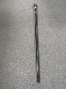 A REPRODUCTION WALKING CANE WITH A CARVED HANDLE