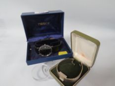 A BOXED GENTS TISSOT WRISTWATCH TOGETHER WITH A LADIES BOXED TISSOT WRISTWATCH