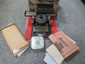 A JUNIOR D.R. PATENTE CHILD'S TYPEWRITER IN ORIGINAL BOX WITH INSTRUCTIONS, RIBBON AND REEL ETC