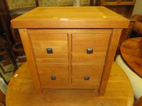 A MODERN OAK 4 DRAWER CHEST