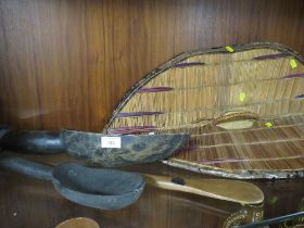 AN EAST AFRICAN UGANDA GANDA WICKER SHIELD WITH HANDLE, a large Zulu porridge spoon, a West