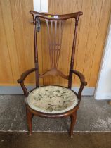 AN ART NOUVEAU STYLE MAHOGANY ARMCHAIR