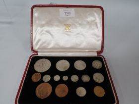 A CASED SET OF GEORGE VI SPECIMEN COINS 1937, in fitted red Moroccan leather case, W 18.5 cm