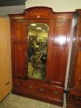 AN ANTIQUE MAHOGANY INLAID WARDROBE WITH CENTRAL MIRROR DOOR