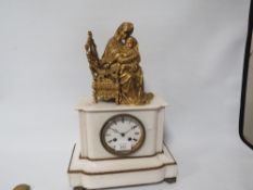 AN ANTIQUE FRENCH MANTLE CLOCK WITH GILT FIGURATIVE DETAIL