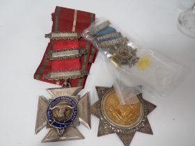 A 19TH CENTURY ANCIENT ORDER OF FORESTERS GLAZED SILVER SASH STAR MEDAL AND SASH, PRESENTED TO P.C.R