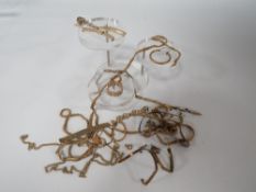 A QUANTITY OF YELLOW MENTAL ANTIQUE JEWELLERY PIECES