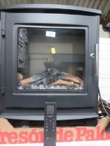 A FLAMETEK ELECTRIC STAND ALONE FIRE WITH REMOTE