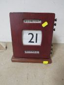 A HOME MADE WOODEN DESK CALENDAR