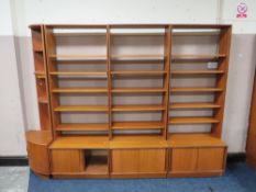 A LARGE MID CENTURY G-PLAN TEAK DISPLAY UNIT, with corner section, in four sections, H 199, W 284