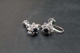 A PAIR OF 18K WHITE GOLD SAPPHIRE AND DIAMOND EARRINGS, each having a screw back setting with a