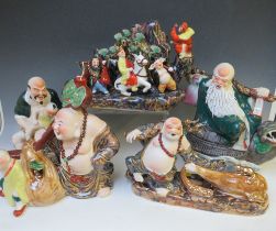 A COLLECTION OF FIVE ASSORTED LARGE ORIENTAL PORCELAIN FIGURES, each dressed in traditional dress,