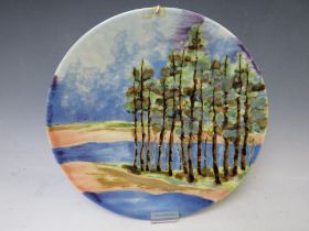 A COBRIDGE CIRCULAR CHARGER BY S. JOHNSON, decorated with trees, impressed factory mark, limited