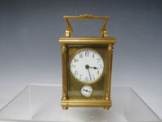 A 19TH CENTURY FRENCH BRASS CARRIAGE ALARM CLOCK, H 10 cm