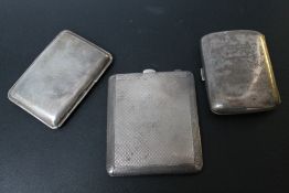THREE HALLMARKED SILVER CIGARETTE CASES, various dates and makers, approx combined weight 220g