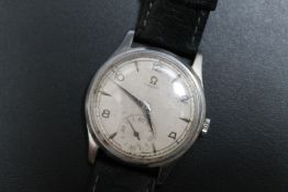 OMEGA - A 1940'S STAINLESS STEEL WRIST WATCH, Cal 265, on replacement leather strap, Dia 3.5