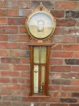 A LATE 19TH CENTURY ROYAL POLYTECHNIC WALL BAROMETER, the oak case with large circular barometer