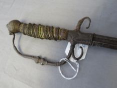 A 17TH CENTURY RAPIER IN RELIC CONDITION, steel pommel and guard, with part wire wrapped grip, L