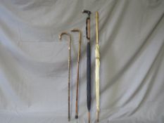 TWO 19TH CENTURY PARASOLS, together with two late 19th / early 20th century walking sticks, some