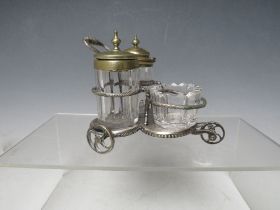 AN EDWARDIAN SILVER PLATED NOVELTY TROLLEY CRUET