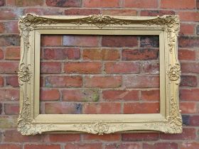 A GILT RECTANGULAR PICTURE FRAME, acanthus moulded detail, rebate 75 x 50 cm, S/D