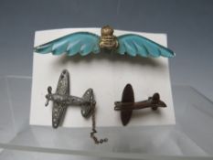 AN R.A.F. SWEETHEART BROOCH, together with two spitfire fund brooches (3)
