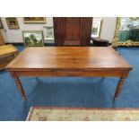 A FRENCH PROVINCIAL DRAWLEAF FRUIT WOOD TABLE, with a single frieze drawer, raised on turned support