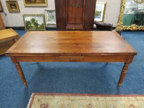 A FRENCH PROVINCIAL DRAWLEAF FRUIT WOOD TABLE, with a single frieze drawer, raised on turned support