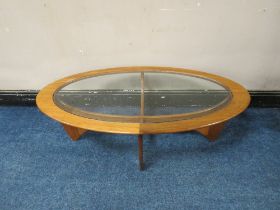 A MID CENTURY G-PLAN TEAK AND GLASS OVAL COFFEE TABLE, H 41 cm, W 122 cm