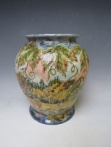 A COBRIDGE LARGE BALUSTER VASE, decorated with Autumnal scenes, impressed factory mark and '02,