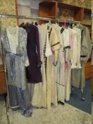 A COLLECTION OF EARLY 20TH CENTURY LADIES VINTAGE CLOTHING, various styles and periods comprising