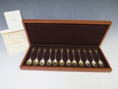 A CASED SET OF TWELVE JOHN PINCHES SILVER SPOONS, for The Royal Society For The Protection Of Birds,
