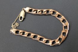 A HALLMARKED 9 CARAT ROSE GOLD FLAT LINK BRACELET, with later 375 yellow gold clasp and safety